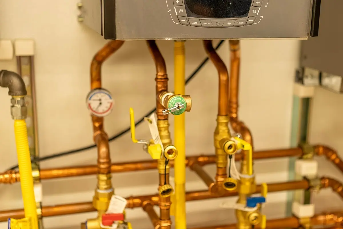 Licensed technician providing Water Heater Installation for a homeowner in Alva